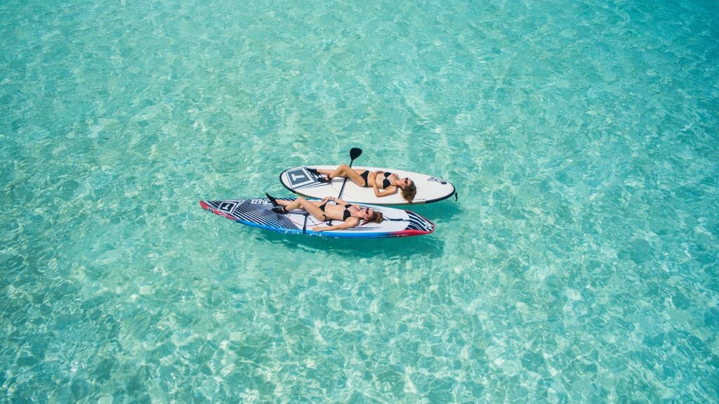 aerial, water, ocean, nature, sea, beach, adventure, trip, vacation, people, woman, paddle, boat, surf