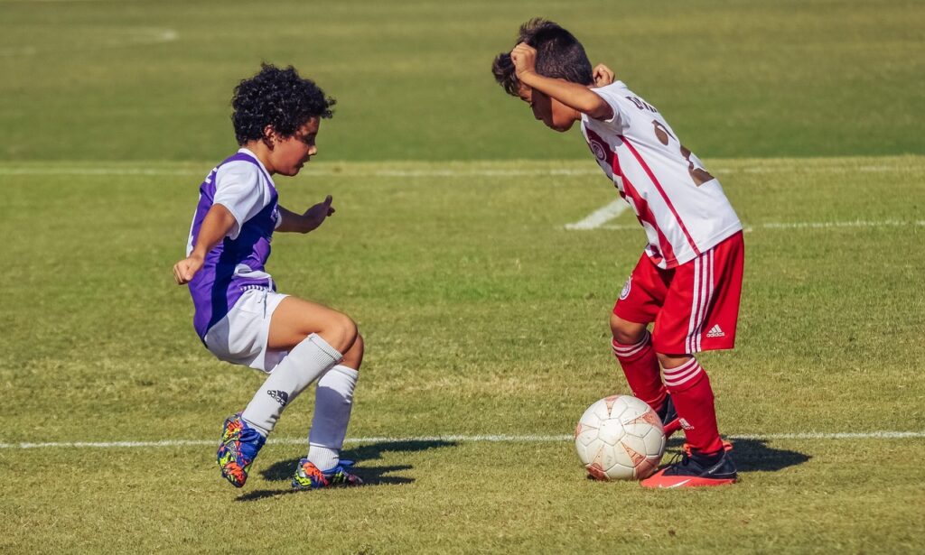 little boys, football, soccer, ball, players, soccer players, boys, athletes, football players, sport, nature, ball sport, football field, field, play, competition, grass, match, playing, kids, sportsmanship